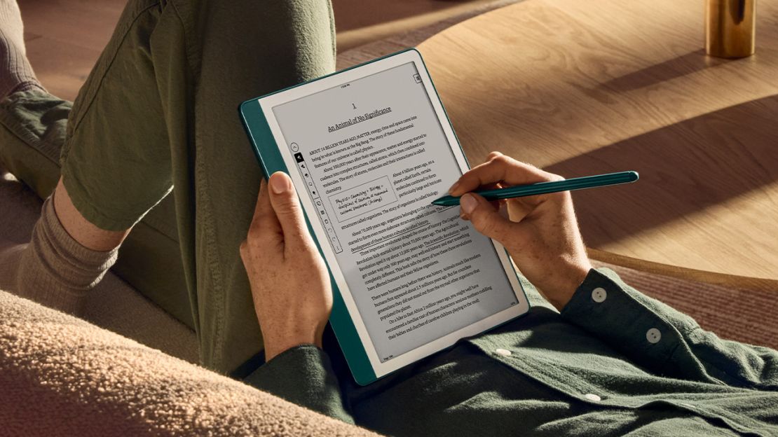 The Amazon Kindle Scribe is being used and a note written on its screen appears in a box that adjusted the text around it.