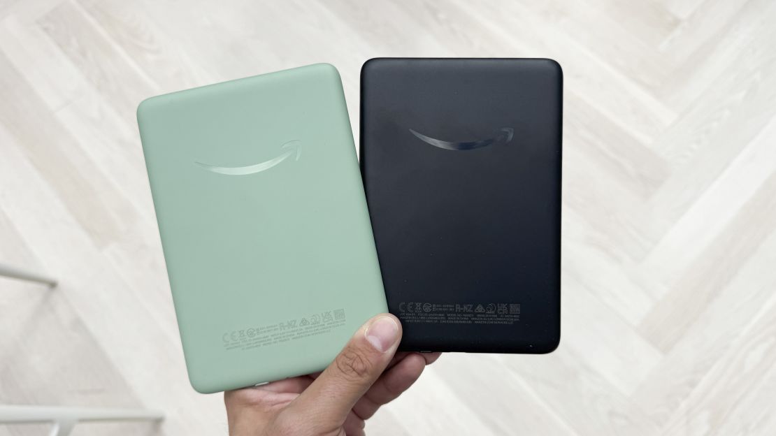 the backs of the Amazon Kindle (2024) in (L, R) Matcha Green and Black