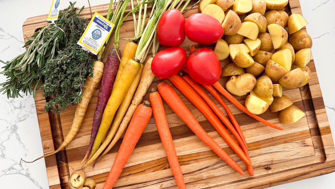 Meal prep ingredients on a Teakhaus cutting board